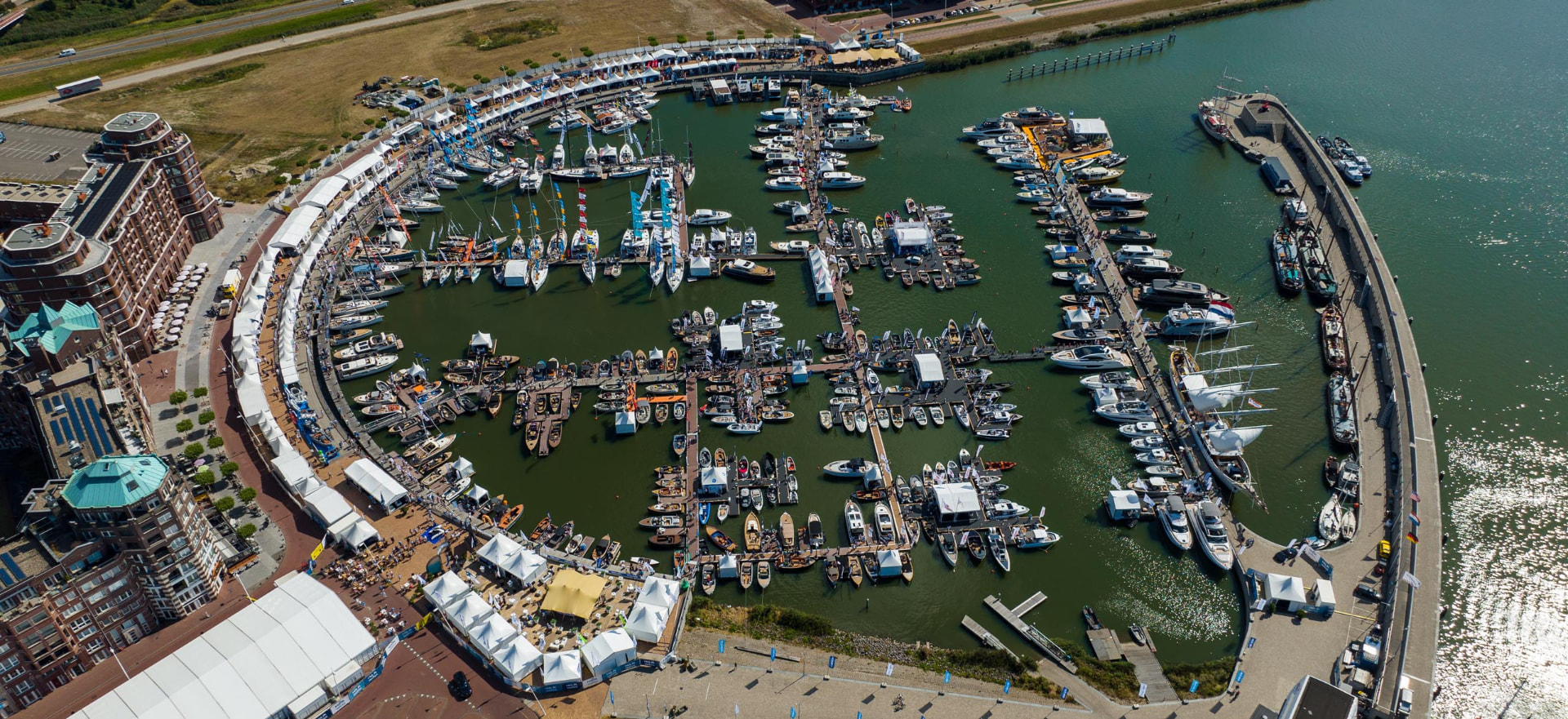 The Bataviahaven and Batavia shipyard of Lelystad with hundreds of boats from the air during a sightseeing flight over Lelystad and Flevoland
